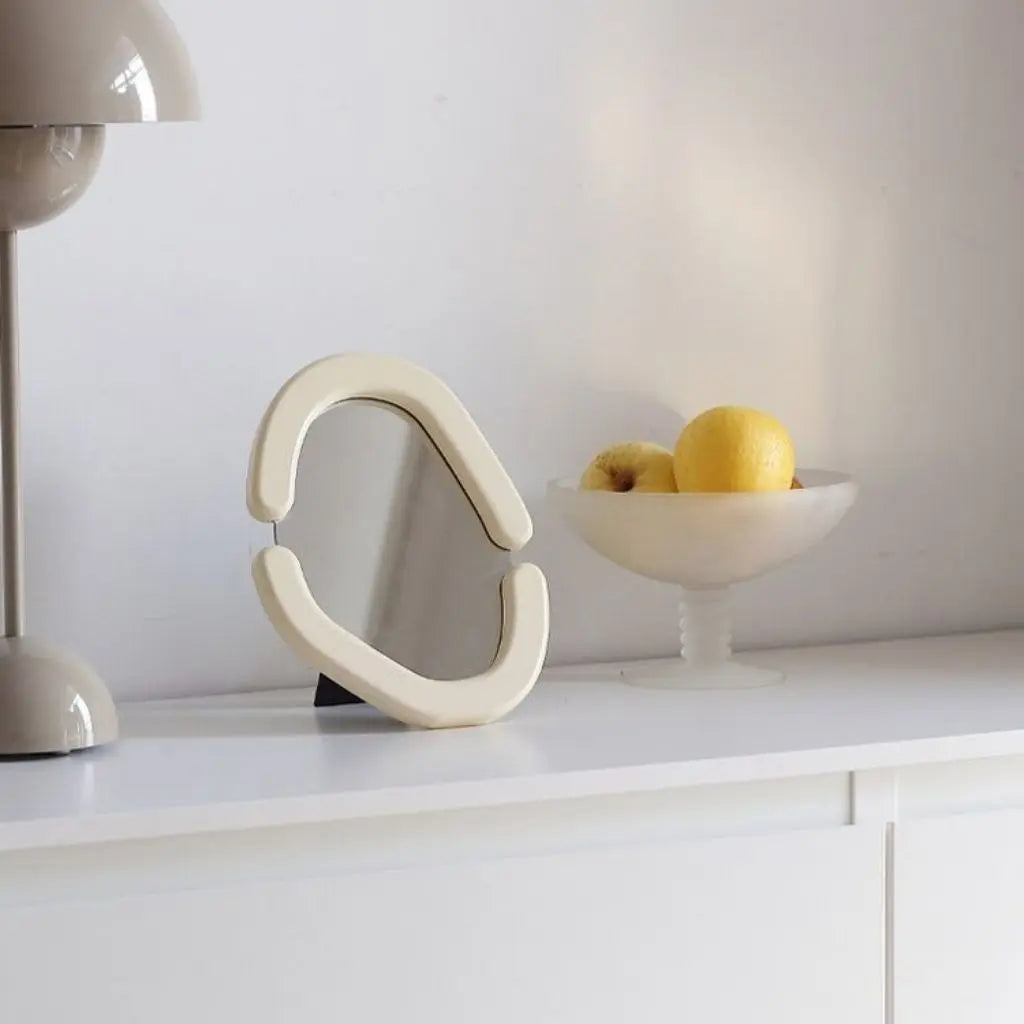 Miroir avec cadre ovale en bois