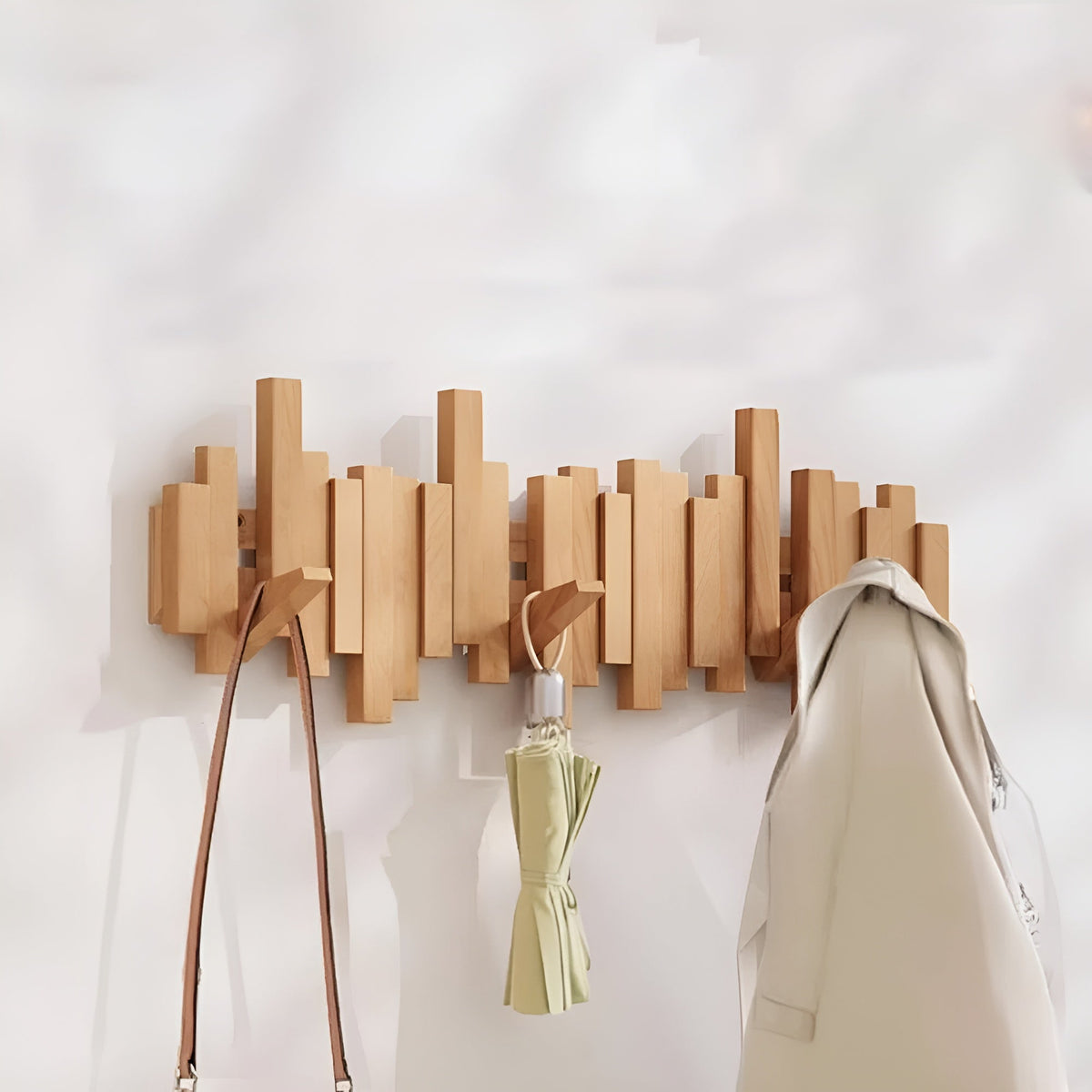 Wall-Mounted Coat Rack with Foldable Hooks and Piano-Key Mechanism