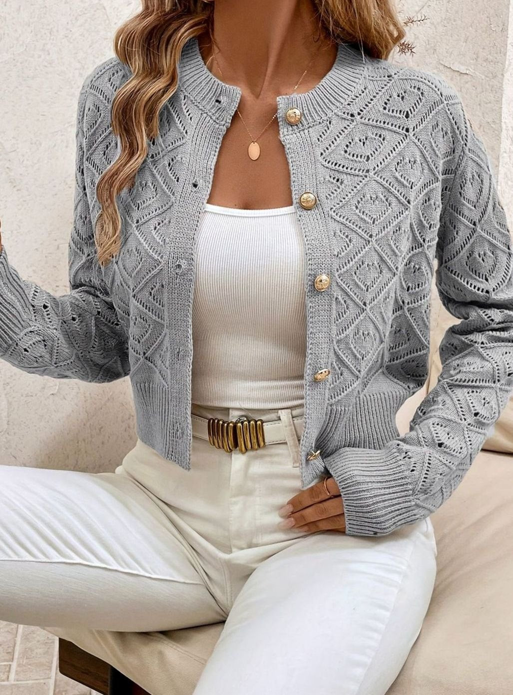 Gilet court pour femme en maille losanges à boutons sur le devant
