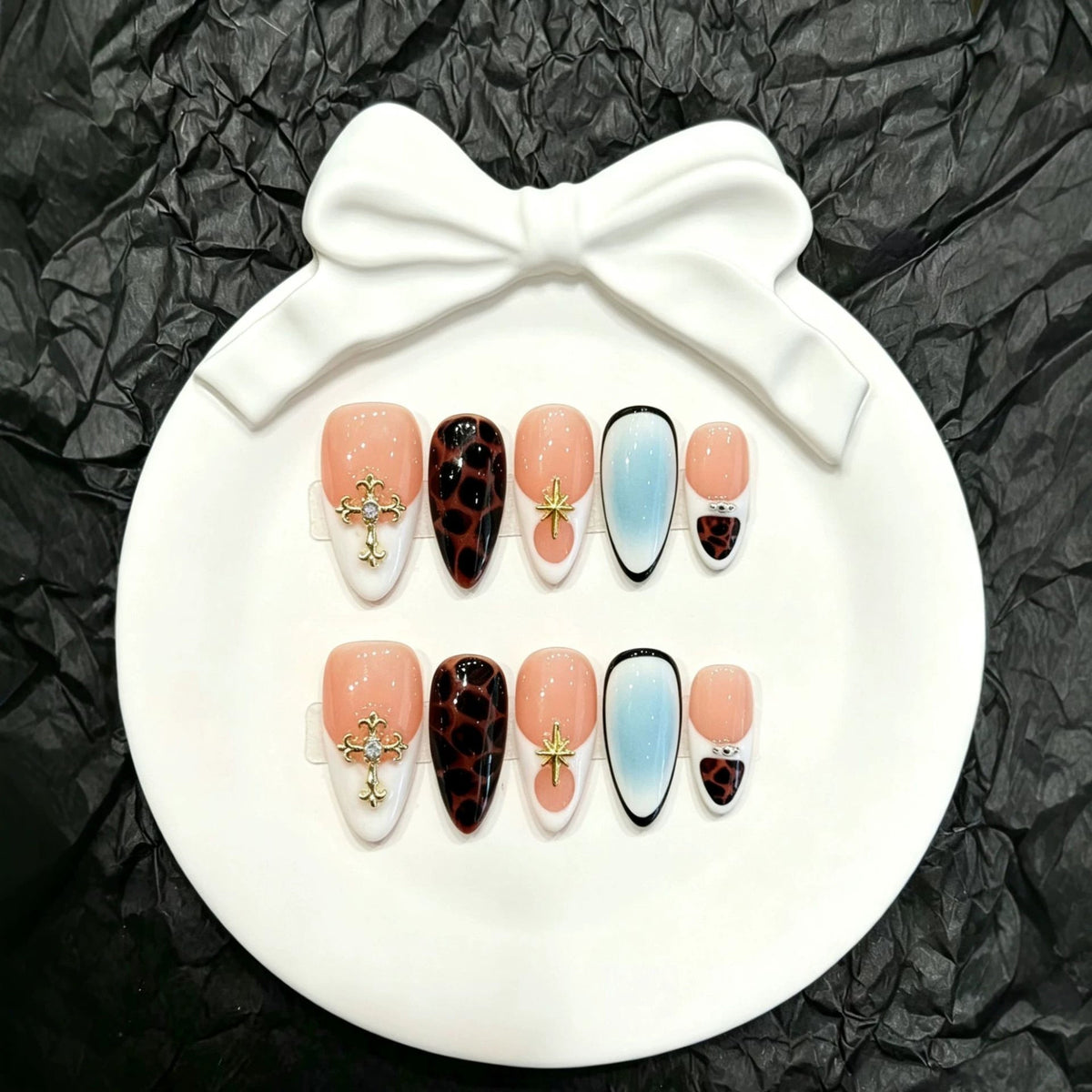 Artistic Press-On Nail Set with Decorative Elements