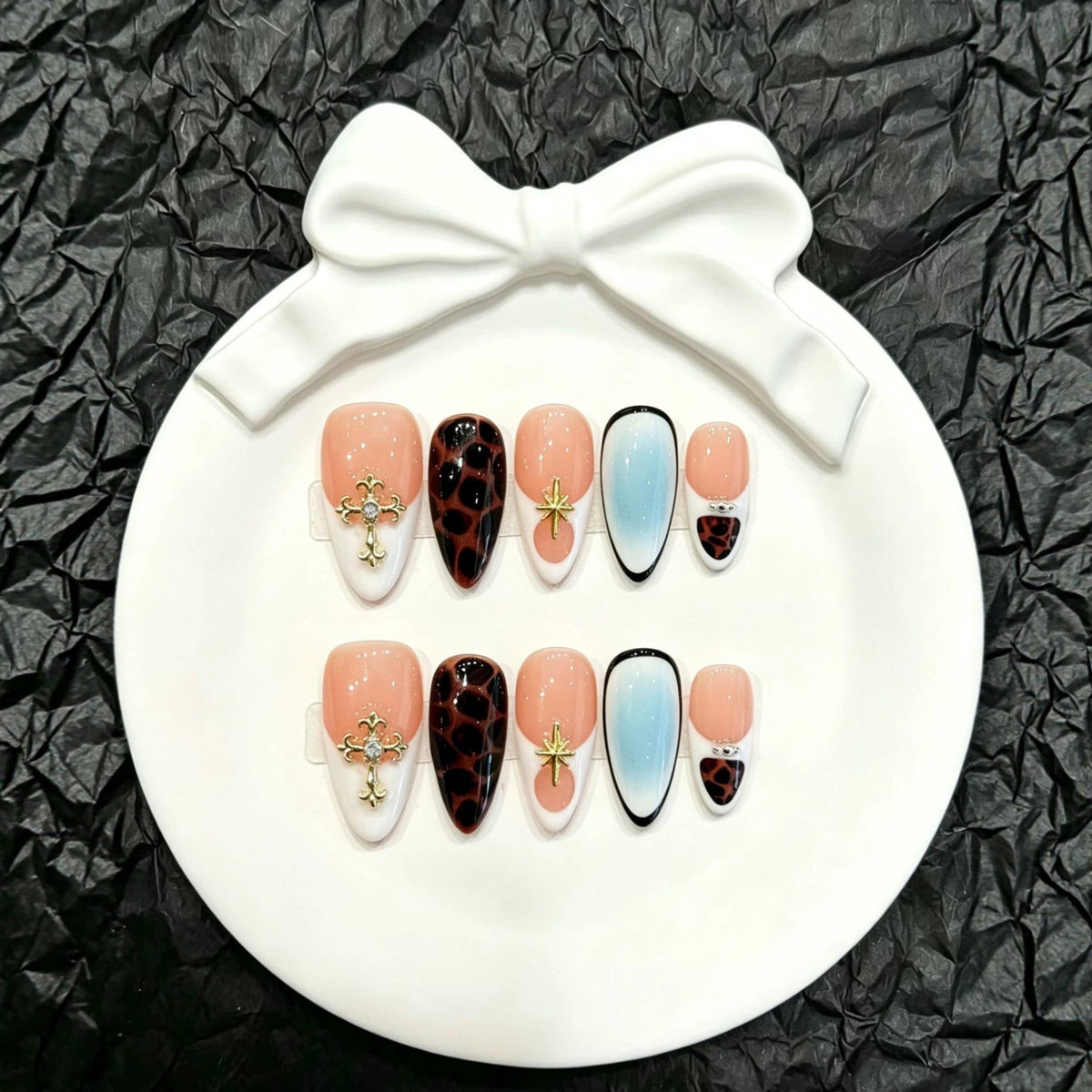 Artistic Press-On Nail Set with Decorative Elements