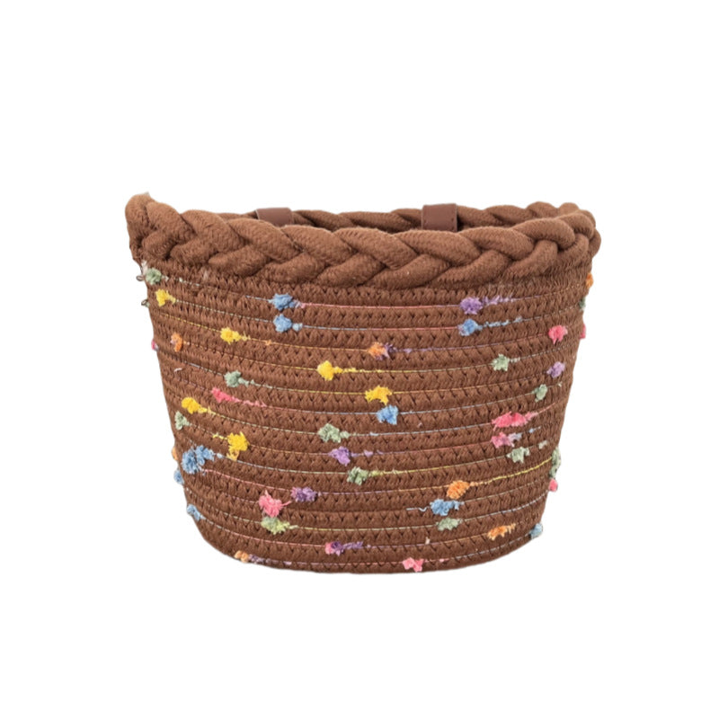 Panier de vélo en corde tressée avec ornements à pompons et sangles de guidon en cuir