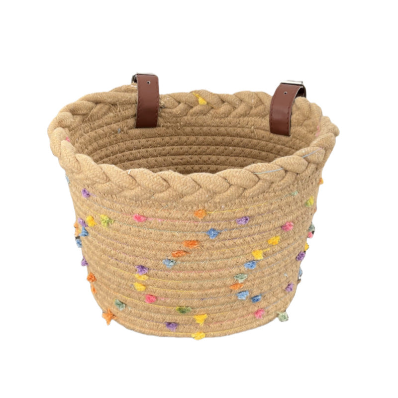 Panier de vélo en corde tressée avec ornements à pompons et sangles de guidon en cuir