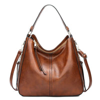 Davy | Sac bandoulière hobo pour femme avec accent zippé