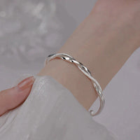Silver Spiral Bangle - Chic Twisted Design