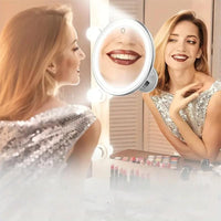 Miroir grossissant éclairé avec ventouse