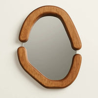 Miroir avec cadre ovale en bois
