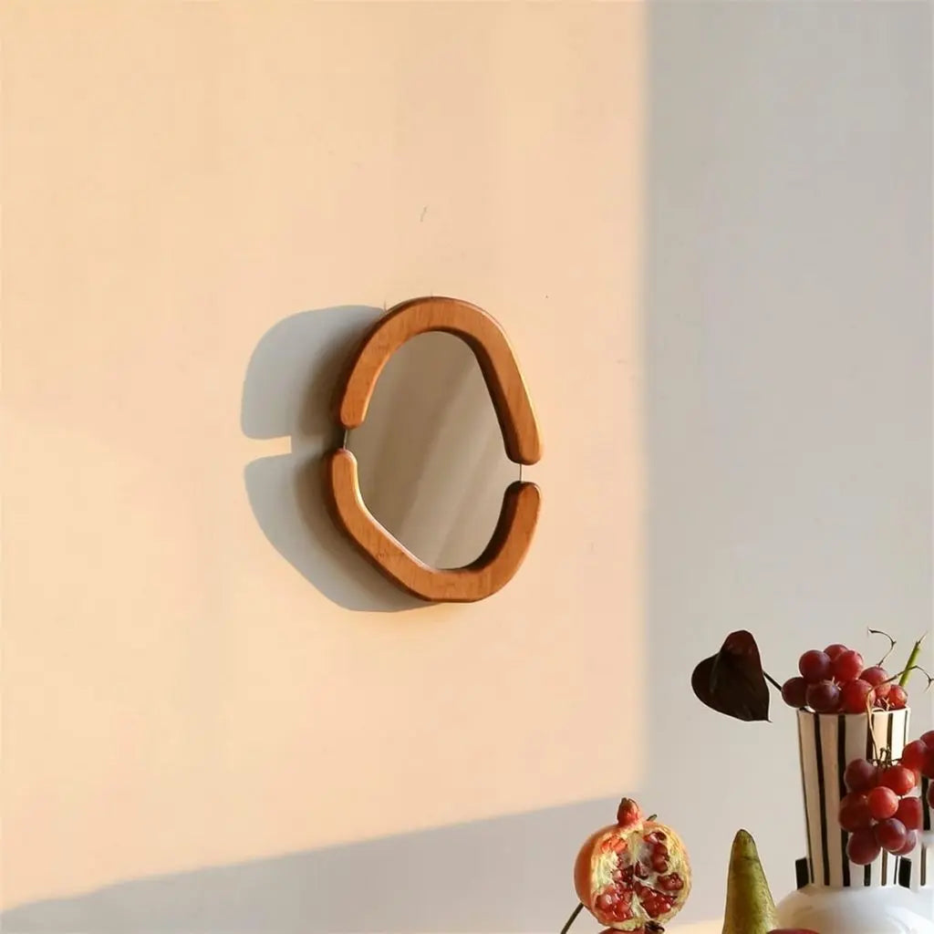 Miroir avec cadre ovale en bois