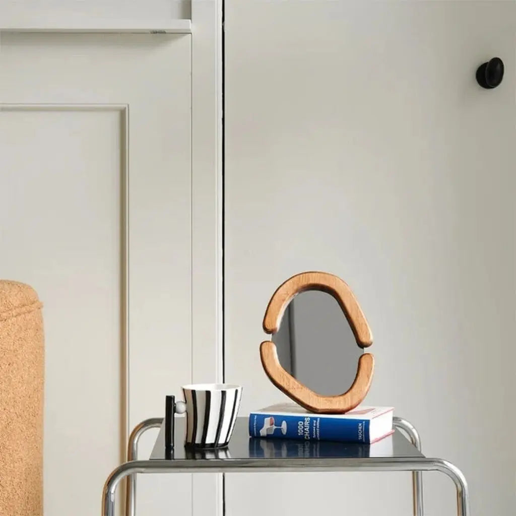 Miroir avec cadre ovale en bois