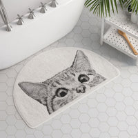 Alfombrilla de baño con gatito curioso