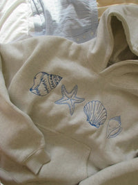 Sudadera unisex gráfica Seaside