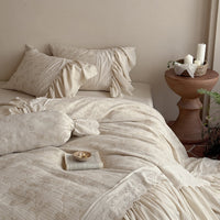 Washed Cotton-Linen Bedding Set with Ruffled Trim, Tone-on-Tone Floral Embroidery, and Lightweight Quilt