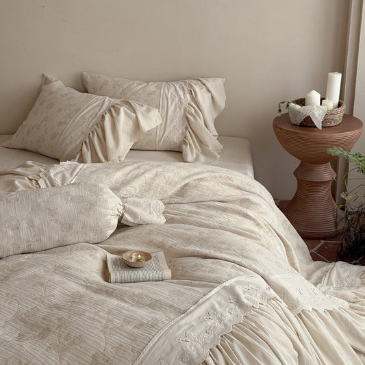 Washed Cotton-Linen Bedding Set with Ruffled Trim, Tone-on-Tone Floral Embroidery, and Lightweight Quilt