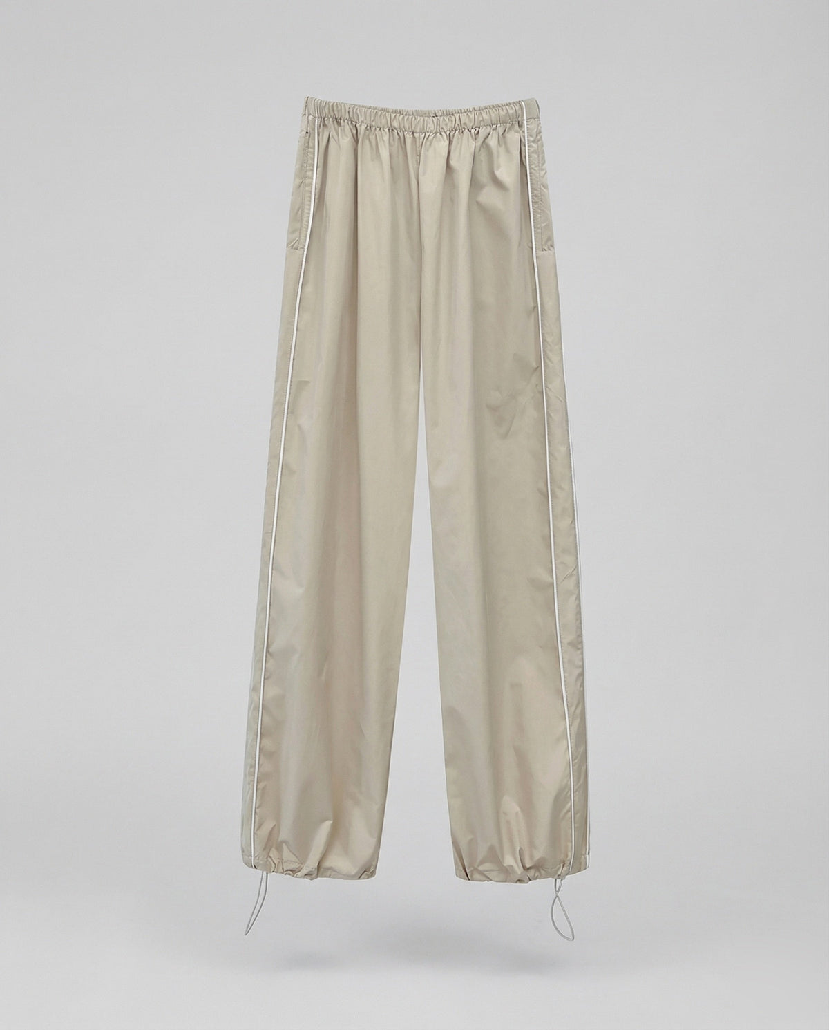 Pantalon de survêtement en nylon pour femme avec bas ajustable par cordon