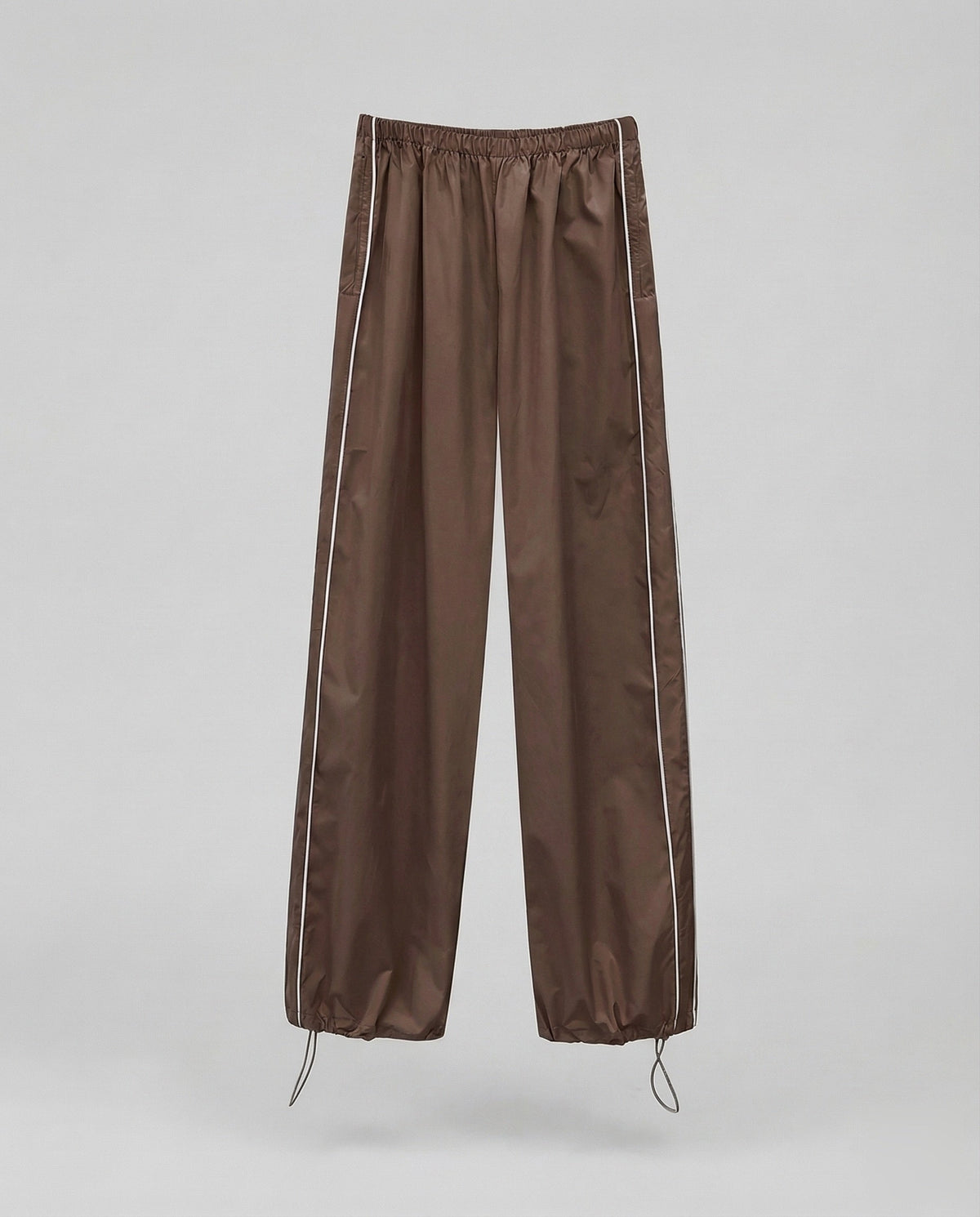 Pantalon de survêtement en nylon pour femme avec bas ajustable par cordon