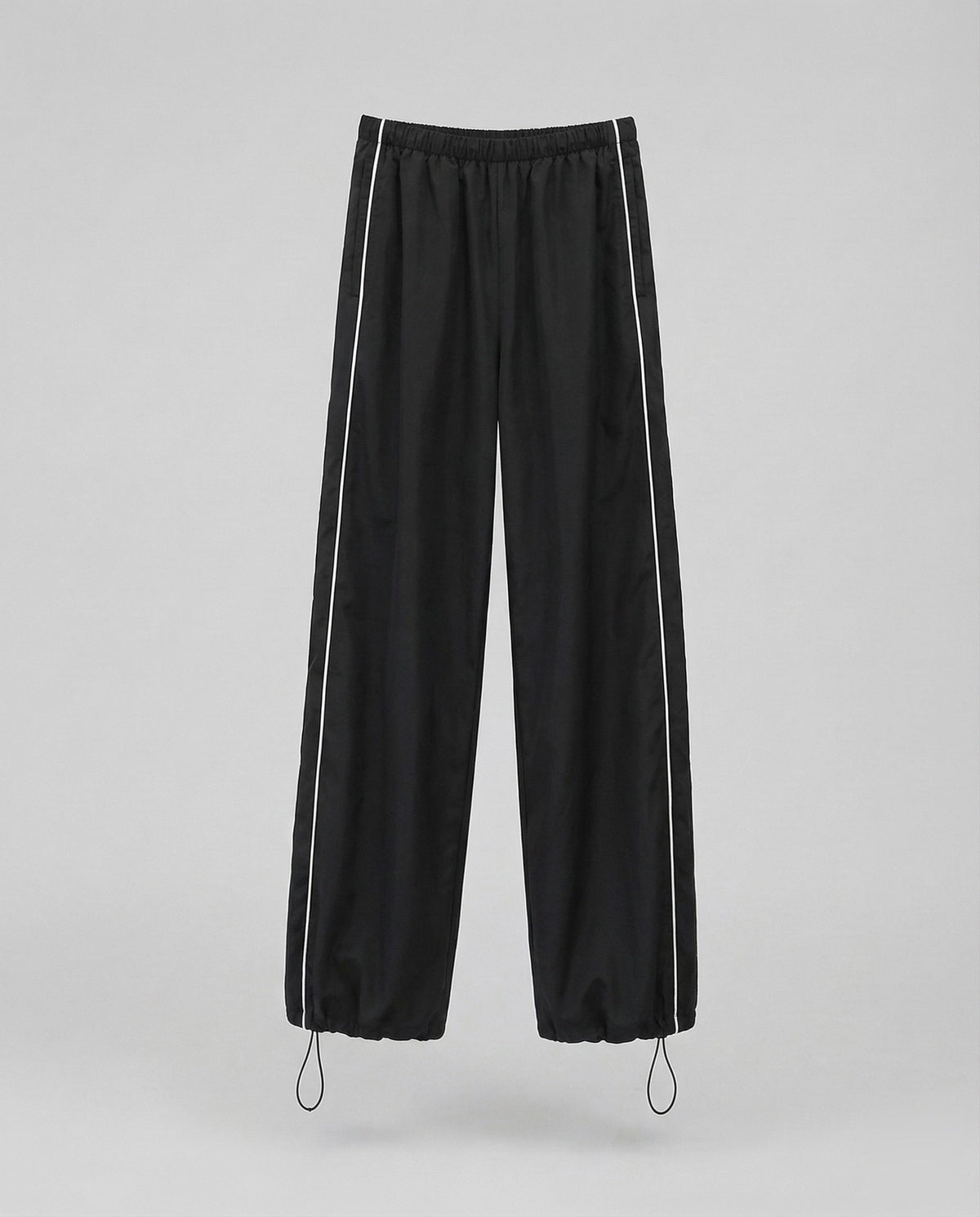 Pantalon de survêtement en nylon pour femme avec bas ajustable par cordon