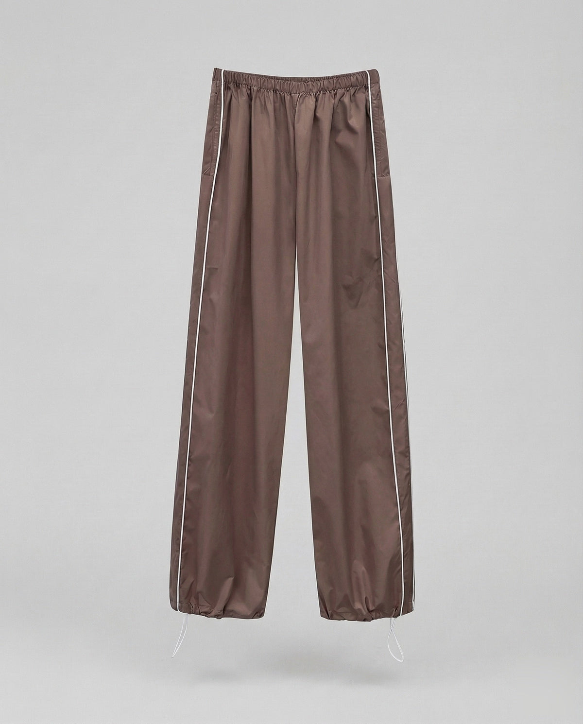 Pantalon de survêtement en nylon pour femme avec bas ajustable par cordon