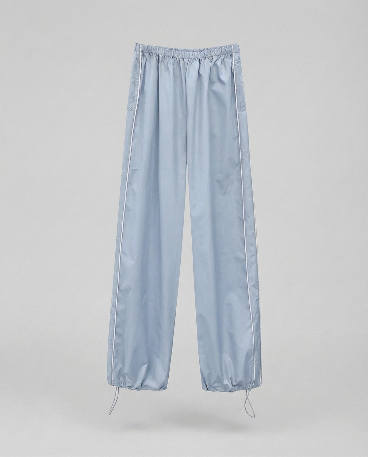 Pantalon de survêtement en nylon pour femme avec bas ajustable par cordon