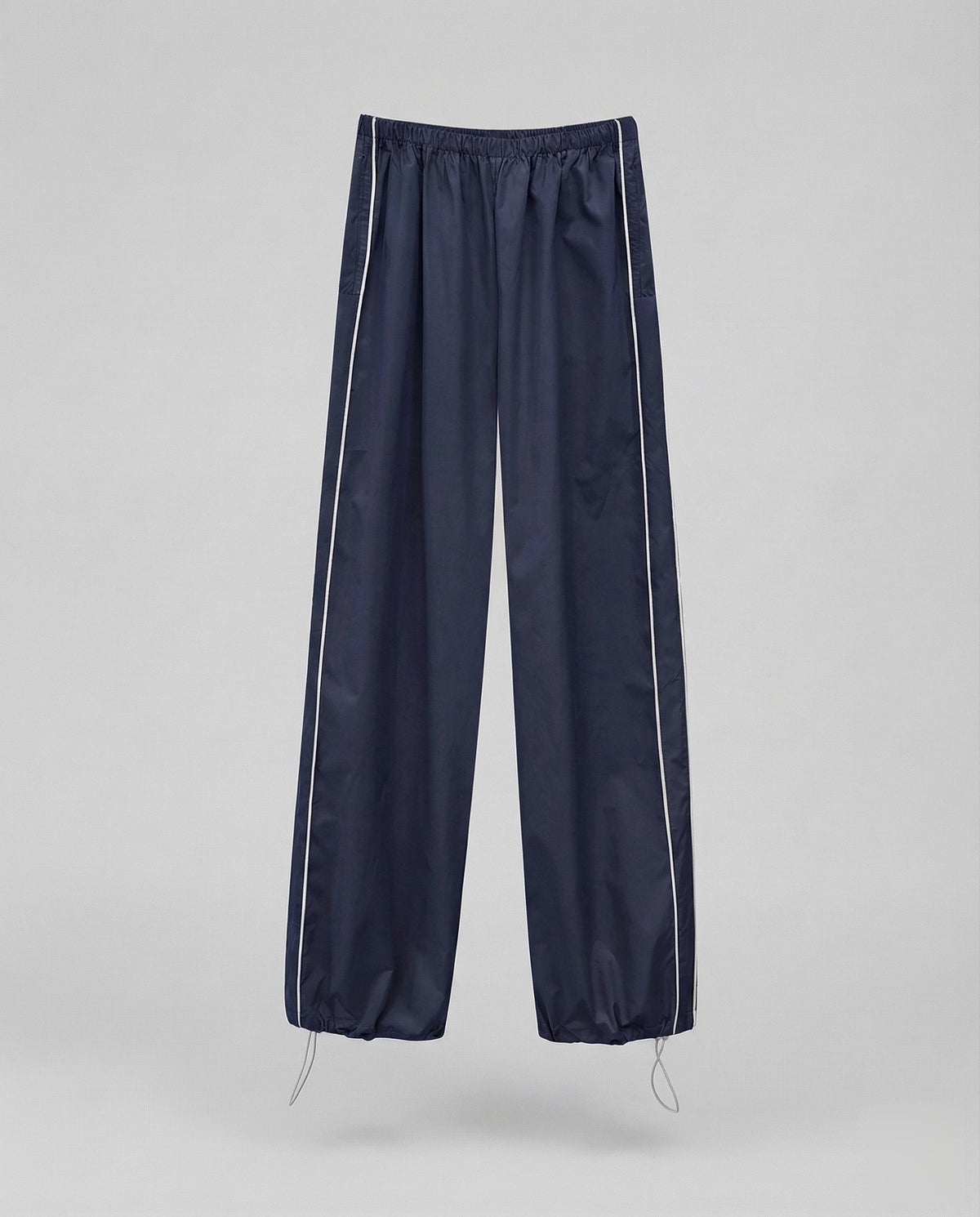 Pantalon de survêtement en nylon pour femme avec bas ajustable par cordon