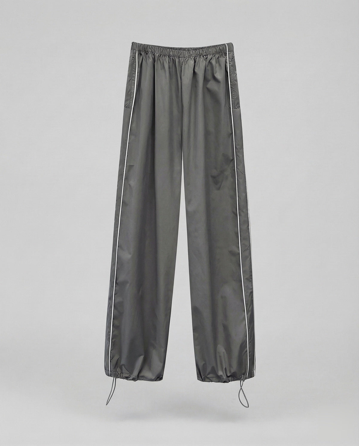 Pantalon de survêtement en nylon pour femme avec bas ajustable par cordon
