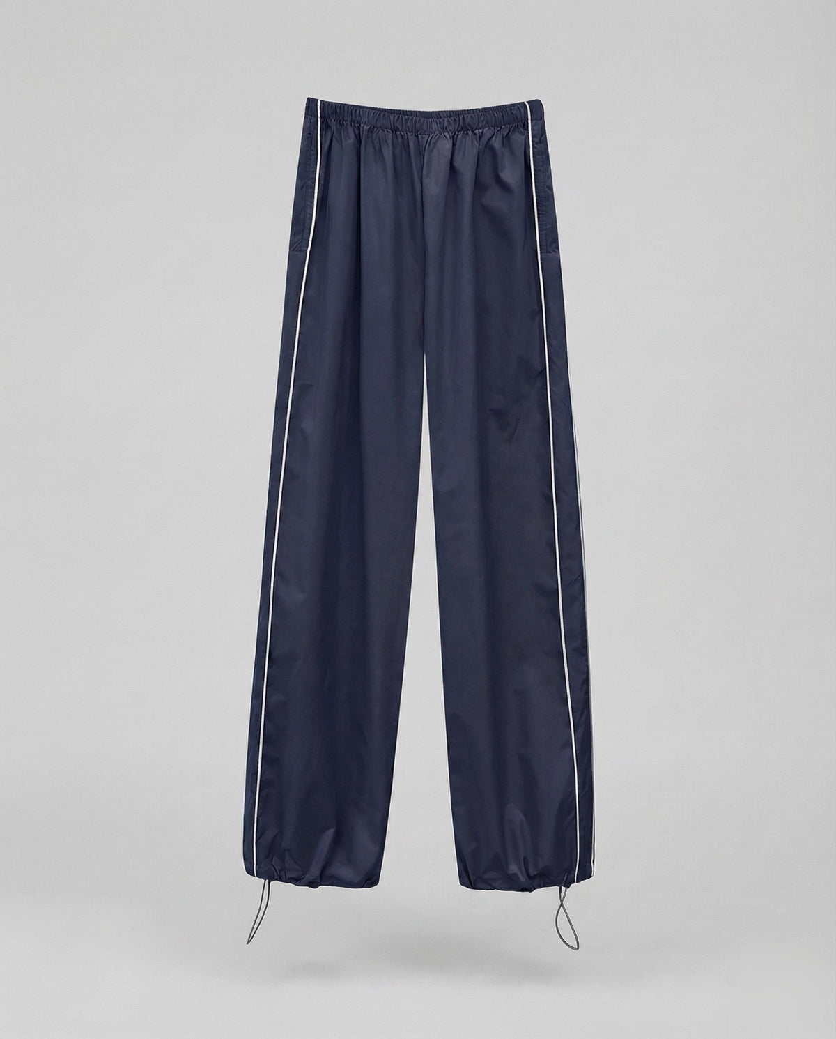 Pantalon de survêtement en nylon pour femme avec bas ajustable par cordon