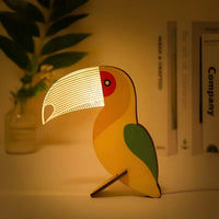 Lampe de table en bois en forme d’animal
